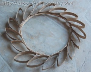 Toilet Paper Roll Craft - Toilet Paper Roll Wreath - Frugal Craft Projects - Toilet Paper Wall Art! This wreath is so beautiful - never would have thought it was made from toilet paper rolls! happydealhappyday.com