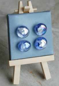 blue glitter magnet with white marble