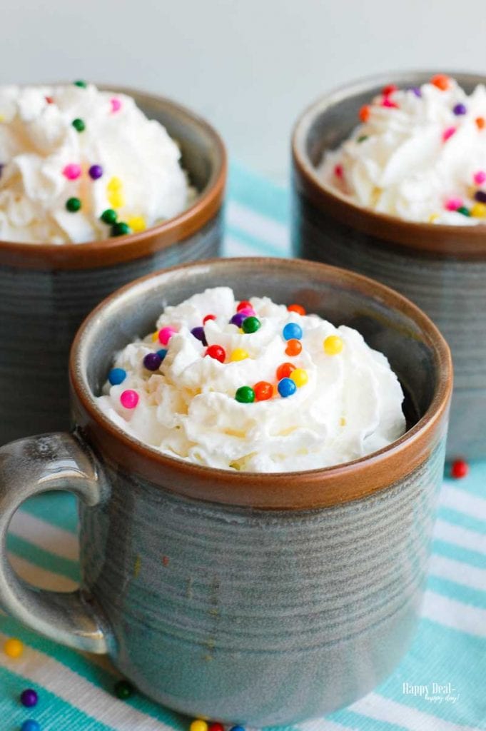 3 Ingredient Mug Cake with whip cream and sprinkles