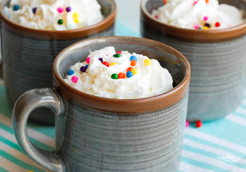 3 Ingredient Mug Cake with whip cream and sprinkles