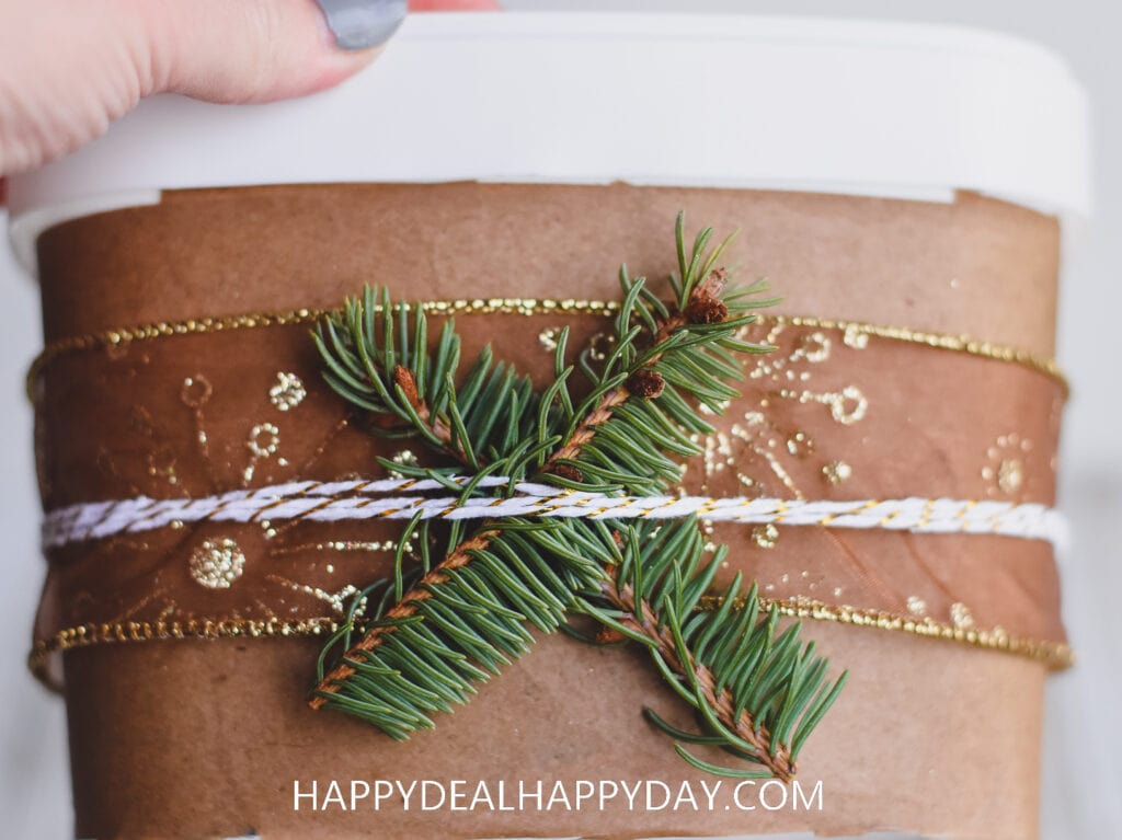 how to upcycle an Oxiclean tub into Christmas Gift wrapping idea