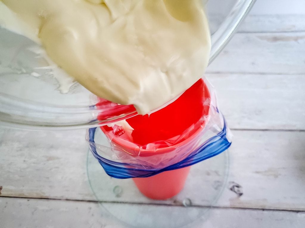 use ziplock bag as pastry bag to add white chocolate to brownie eggs